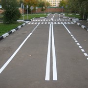 Нанесение дорожной разметки фото