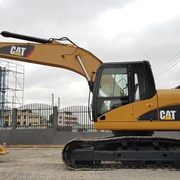 Услуги гусеничного экскаватора Caterpillar фото
