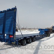 Низкорамный полуприцеп трал 45 тн с гидротрапами под каток,фрезу фото