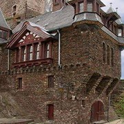 Отделка фасадов частных домов камнем фото