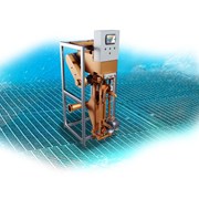 Дозатор трудносыпучих материалов в клапанные мешки фото