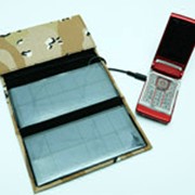 Зарядные устройства для мобильных телефонов фото