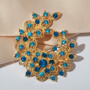 Брошь 'Императрица' подкова, цвет морской в золоте фото