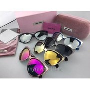 Солнцезащитные очки Miu Miu 04Q фото
