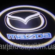 Проекция логотипа автомобиля Mazda фото