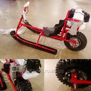 Новейшая модель снегоката с мотором для детей фотография