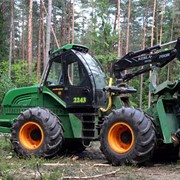 Тягач Амкодор трелевочный с манипулятором фото