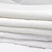 Махровые полотенца для гостиниц фотография