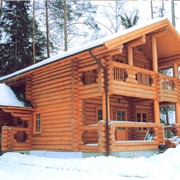 Дом из бревна (строганного) фото