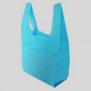 Производство многоразовых сумок из нетканого материала спанбонд. фотография
