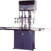 Полуавтоматическая машина для разлива жидкости по уровню в напольном исполнении PERL BOST. Серии дозировочных машин PERL Packaging Systems фото