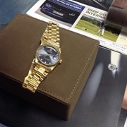 Золотые часы "Rolex".