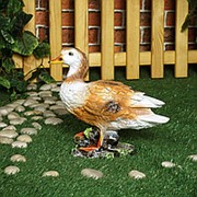 Фигура Утка на камнях фото