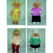 Дидактична лялька з набором сезонного одягу фото