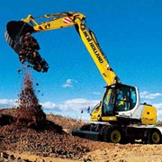 Экскаватор колесный New Holland (O&K) MH Plus фотография