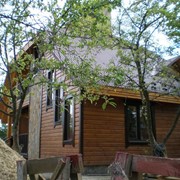 Дома деревянные из оцилиндрованного бруса фото