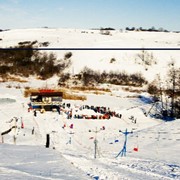 Обучение катанию на сноуборде.Сорочин Яр - это современная горнолыжная база, центр активного зимнего отдыха. фотография