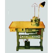 Машина швейная промышленная с трехфазным электроприводом, установленном на промстоле фотография