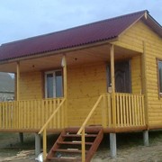 Каркасный деревяный дом с терассой фото