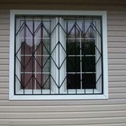 Решетки на окна и двери защитные металлические фото