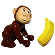Дрессируем питомца. Мартышка с бананом. фото