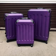 Дорожный противоударный чемодан с колесами 76 х 32 х 56 см фиолетовый фото
