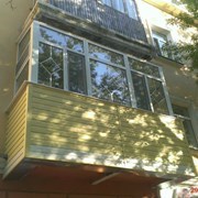 Обшивка балкона сайдингом фото