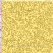 Желтая ткань с золотыми “огурцами“ фото
