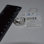 Кольцо серебряное родированное с фианитами фото