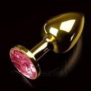 Маленькая золотистая анальная пробка с круглым кончиком и рубиновым кристаллом - 7 см. Пикантные штучки фото