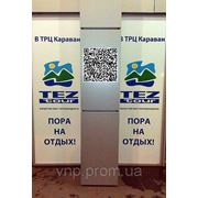 Оклейка оракалом фасада в ТЦ КАРАВАН для агенства TEZ TOUR в Днепропетровске фото