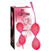 Розовые вагинальные шарики с хвостиком для извлечения фотография
