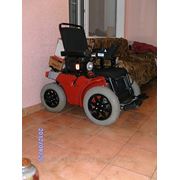 Инвалидная коляска с электроприводом. фото
