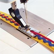 Лапка для пришивания шнура декоративным швом фотография