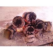 Брикет топливный (сырье - измельченная стружка из твердой породы лиственных деревьев) фотография