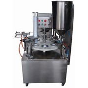 Интегрированная машина для фасовки жидких продуктов ( сметана, йогурт ) в стаканы и запайки платинки