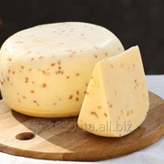 Молодий Голандський сир з пажитніком фото