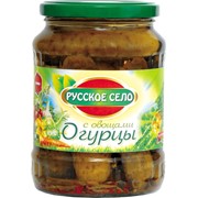 Огурцы маринованные с овощами фотография