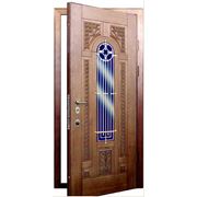 Двери входные металлические(листовая сталь 2 мм.) Серия ’Классика’(стальная решеткарезьба по дереву)