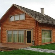 Строительством деревянных домов из оцилиндрованного бревна