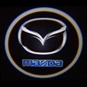 Проекция логотипа Mazda фотография