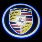 Проекция логотипа Porsche фотография