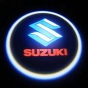 Проекция логотипа Suzuki фотография