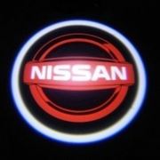 Проекция логотипа Nissan фото