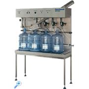 Полуавтоматическое оборудование NORLAND Серии BF для разлива воды в 10 - 20 литровые бутыли и их укупорки фото