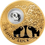 Монеты на счастье. Слоник - позолоченная серебряная монета с серебряным слоником во внутренней капсуле (в открытке) фото