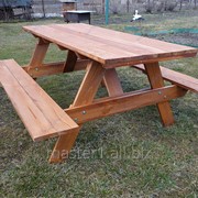 Недорогая дачная садовая деревянная мебель стол с лавками фотография