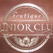 Вышитый герб детского магазина Junior Club фото