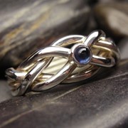 Серебряное кольцо головоломка с синим сапфиром от Wickerring фото