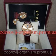 Турмалиновые часы с анионами для нормализации давления Вековой Восток фотография